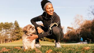 Woman runner with dog