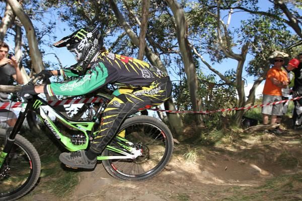 Two-time junior downhill world champ Troy Brosnan leads the elite men's downhill... and is too fast for the photographer!