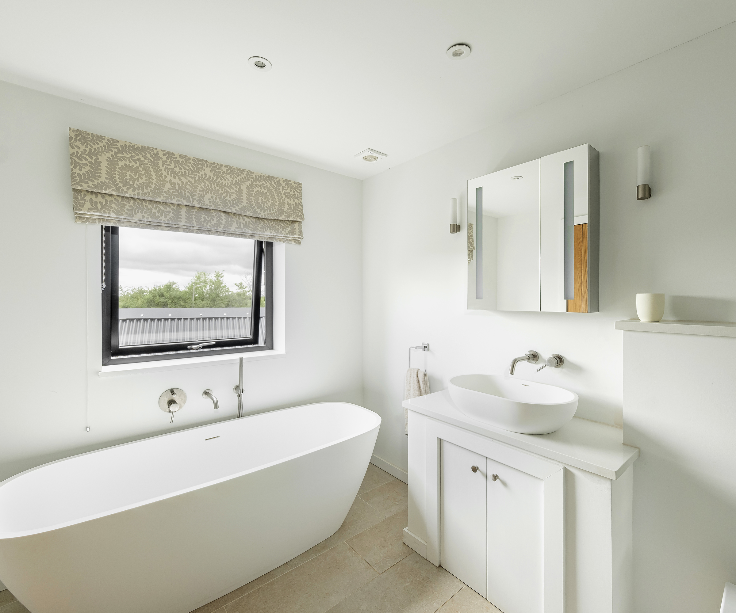 A clean and contemporary bathroom in a self build