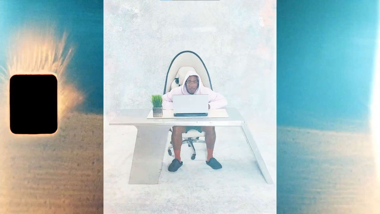 Alienware's Bodega collaboration egg chair promo shot with someone sitting in it