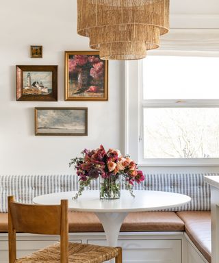 coastal breakfast nook with vintage painting