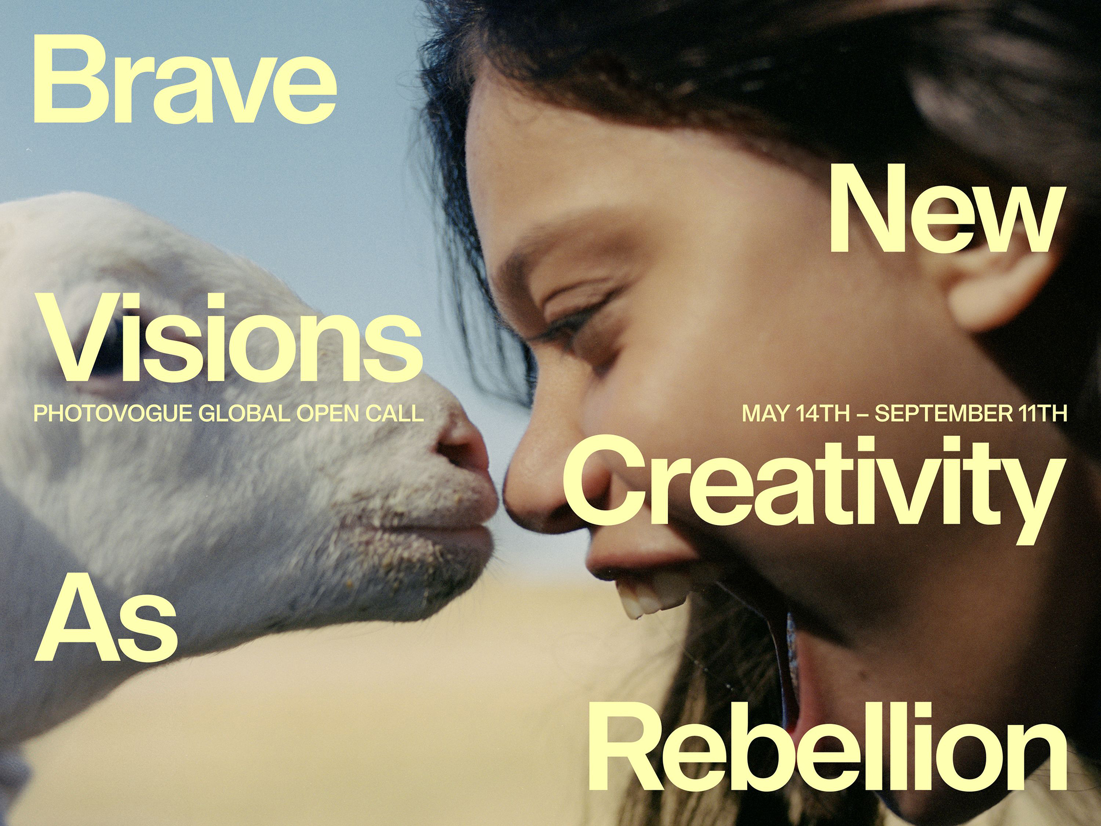 Close-up of a person smiling and touching noses with a white goat, overlaid with text promoting a PhotoVogue global open call