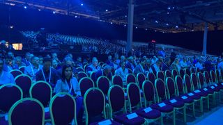 Delegates sitting in the keynote theatre at HPE Discover 2023