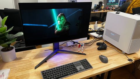 LG UltraGear 27GR95QE-B on desk. 
