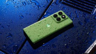 The Motorola Edge 60 resting on a car bonnet