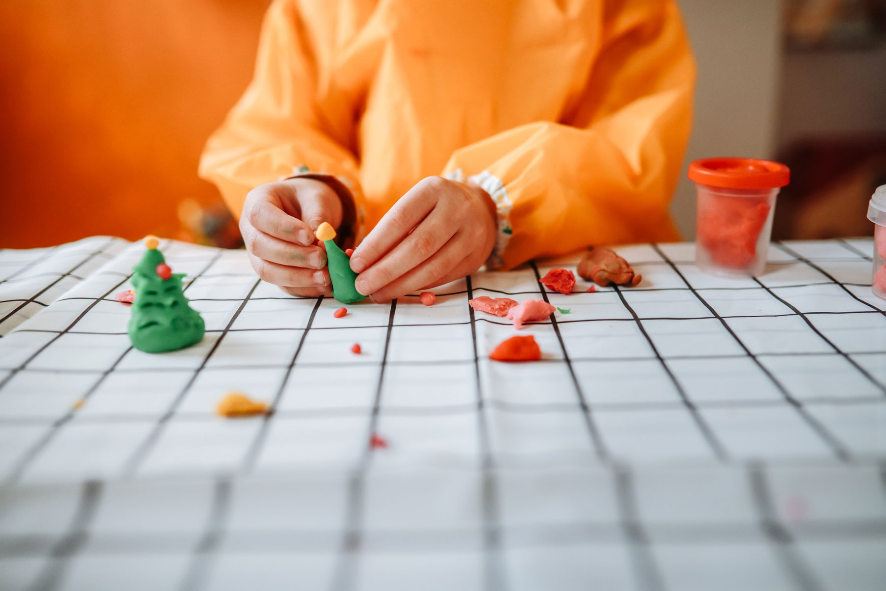 A child making playdough