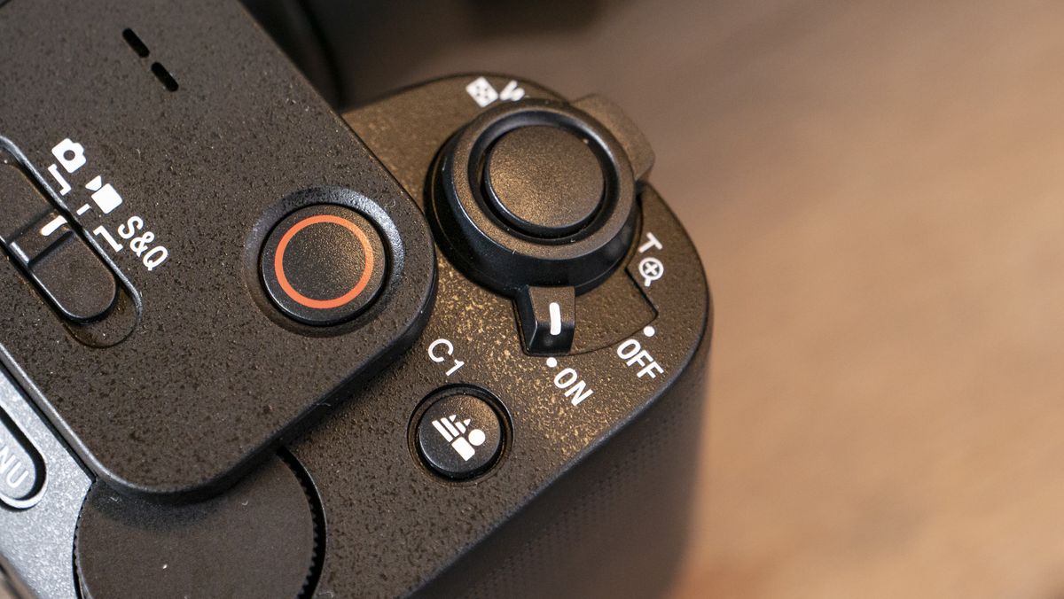 The Sony ZV-E1 camera sitting on a wooden table