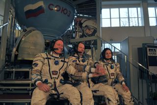 The Expedition 41/42 crew includes, from left, Barry Wilmore (NASA), Alexander Samokutyaev (Roscosmos) and Elena Serova (Roscosmos).