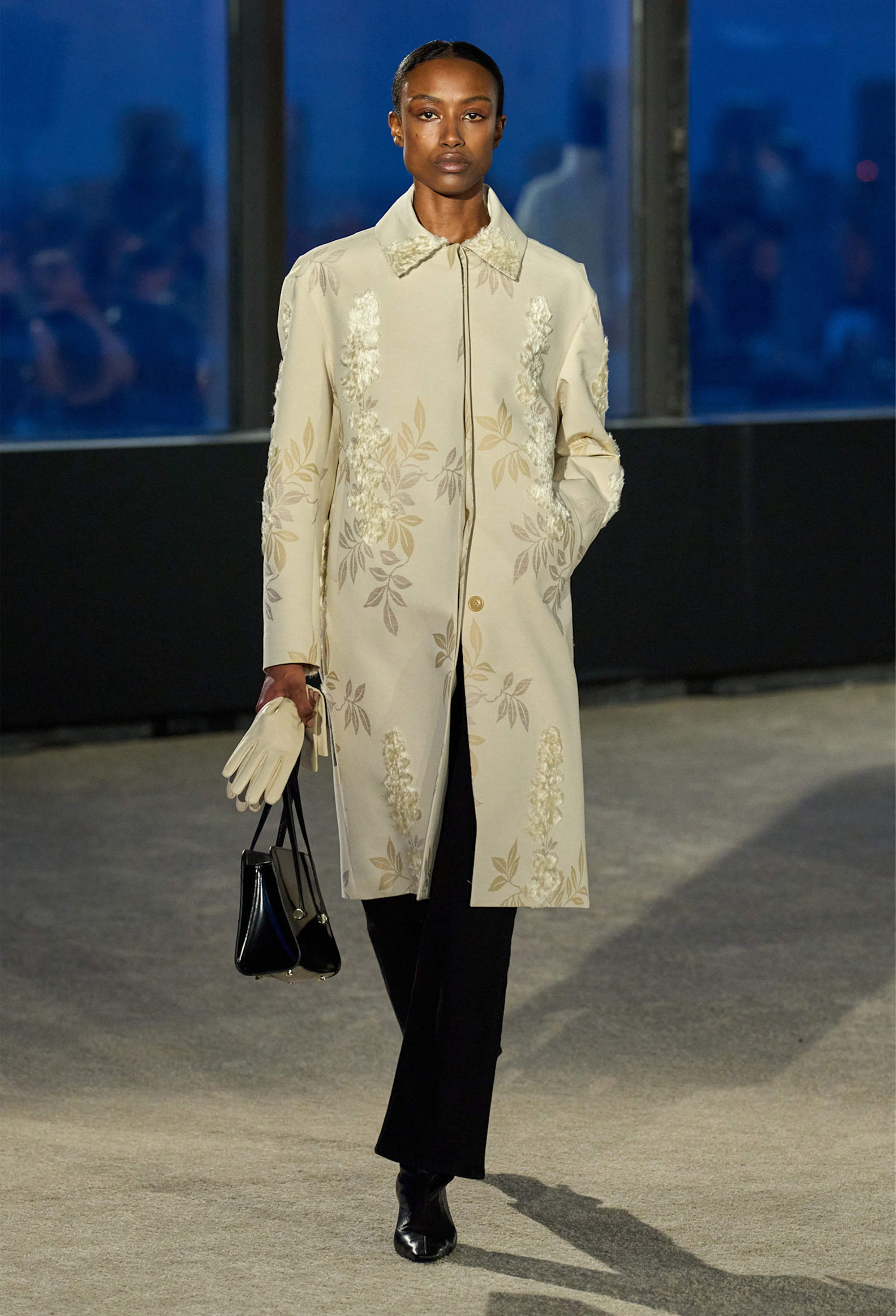 Runway model wearing the romantic fashion trend.