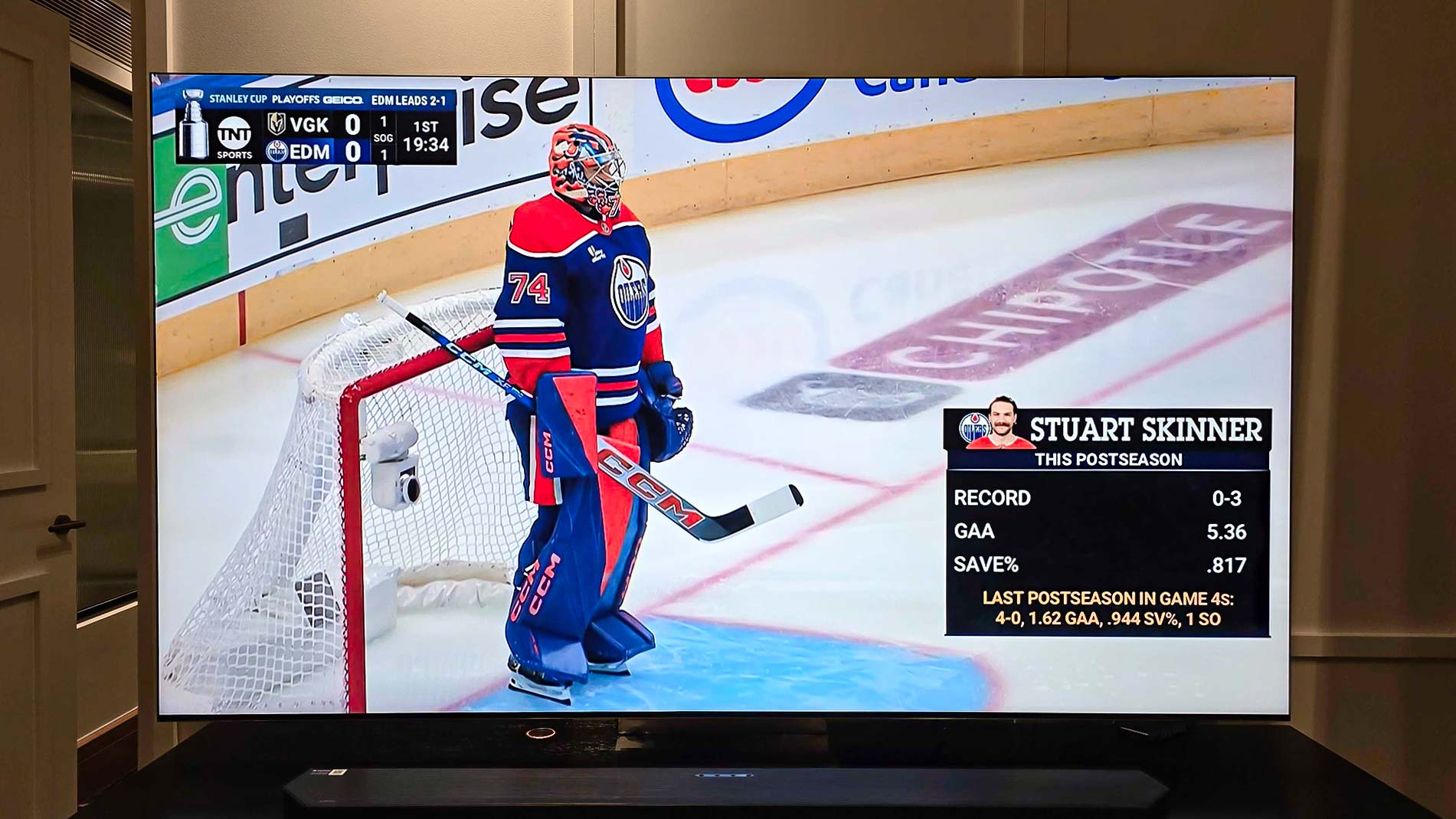 Live sports on a Samsung QN990F TV.