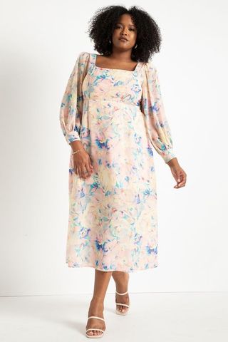 model wearing pastel floral dress