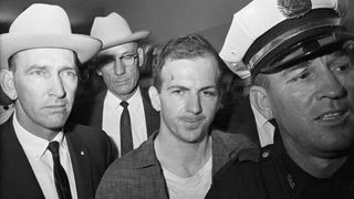 Lee Harvey Oswald is pictured after his arrest on 22 November