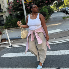 Aniyah in barrel trousers, a vest and ballet flats