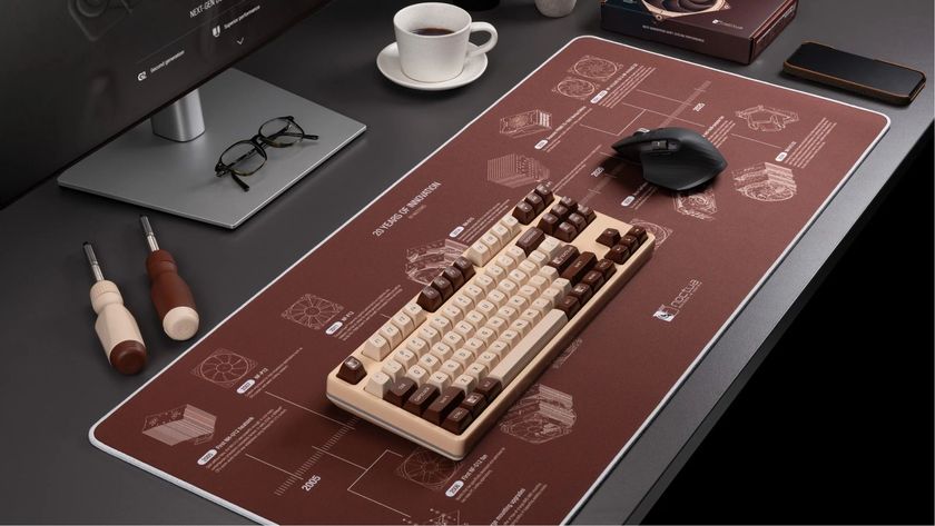 The Noctua NP-DM3 deskmat in a gaming setup showing a mouse and keyboard on top of it