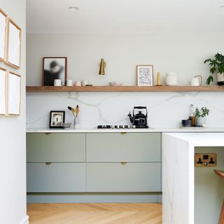 Kitchen with white wall and grey cabinet
