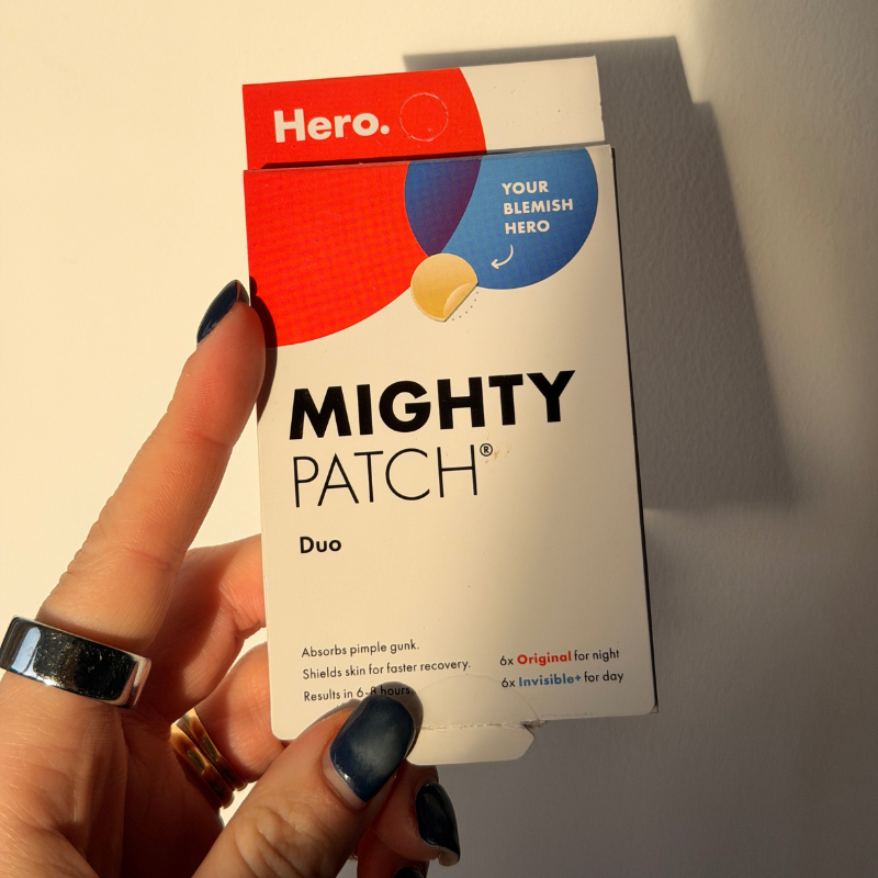 A photo of Grace holding the hero mighty patch box