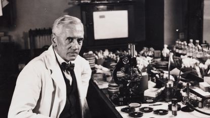 Professor Fleming, Scottish bacteriologist, in his laboratory, 1943. 