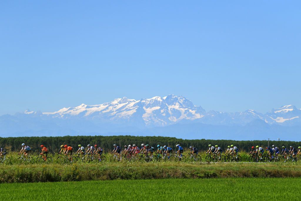 TURIN ITALY AUGUST 05 Landscape Peloton Torino rice fields Mountains during the 101st Milano Torino 2020 a 198km race from Mesero to Stupinigi Turin MilanoTorino on August 05 2020 in Stupinigi Turin Italy Photo by Tim de WaeleGetty Images