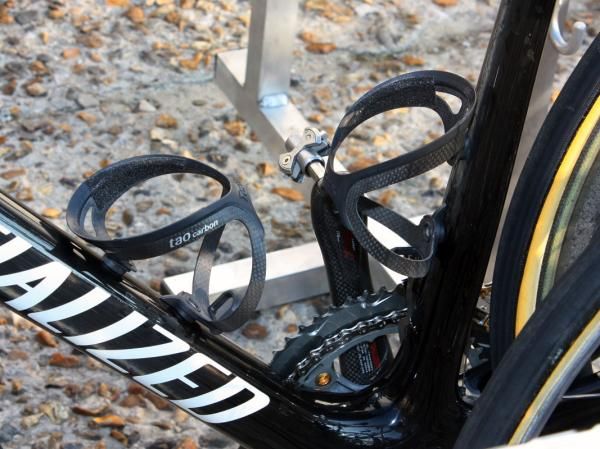 Grip tape is applied to the inside of the Tacx Tao Carbon cages on Fabian Cancellara's (Saxo Bank) Specialized 'Project Black' (surely a prototype for the upcoming S-Works Roubaix SL3) for a better hold on the bottles.