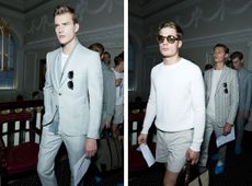 Guys wearing Gieves & Hawkes S/S 2015 collection. On the left the guy is wearing a chalky white suit with a light blue scarf, white t-shirt and sunglasses in his pocket. On the right the guy is wearing a white knitted jersey, chalky white shorts and sunglasses.