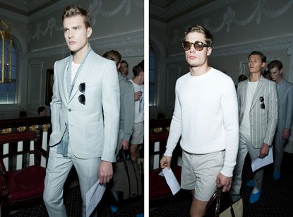 Guys wearing Gieves & Hawkes S/S 2015 collection. On the left the guy is wearing a chalky white suit with a light blue scarf, white t-shirt and sunglasses in his pocket. On the right the guy is wearing a white knitted jersey, chalky white shorts and sunglasses.