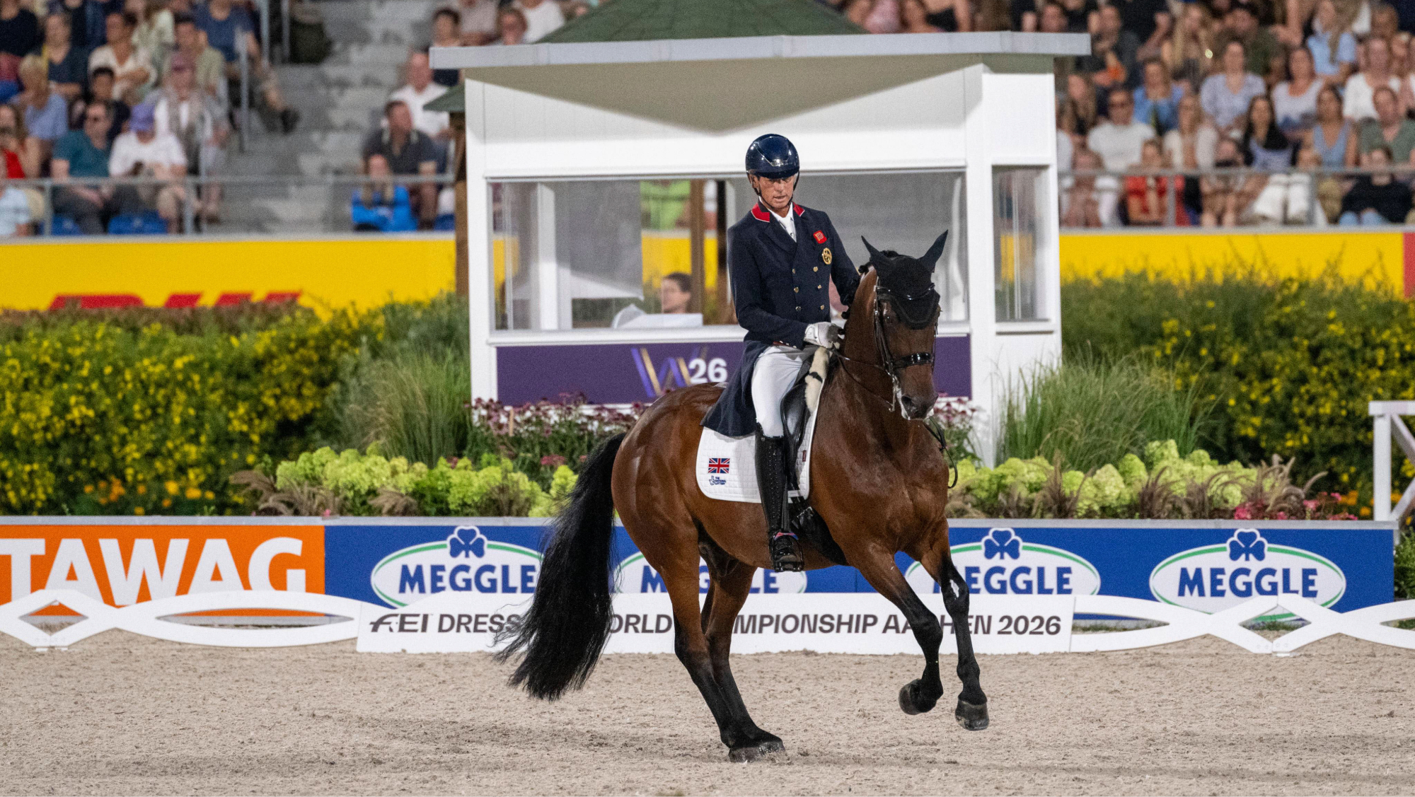 Carl Hester riding a pirouette on fame in the freestyle at the 2026 World Dressage Championships in Aachen.