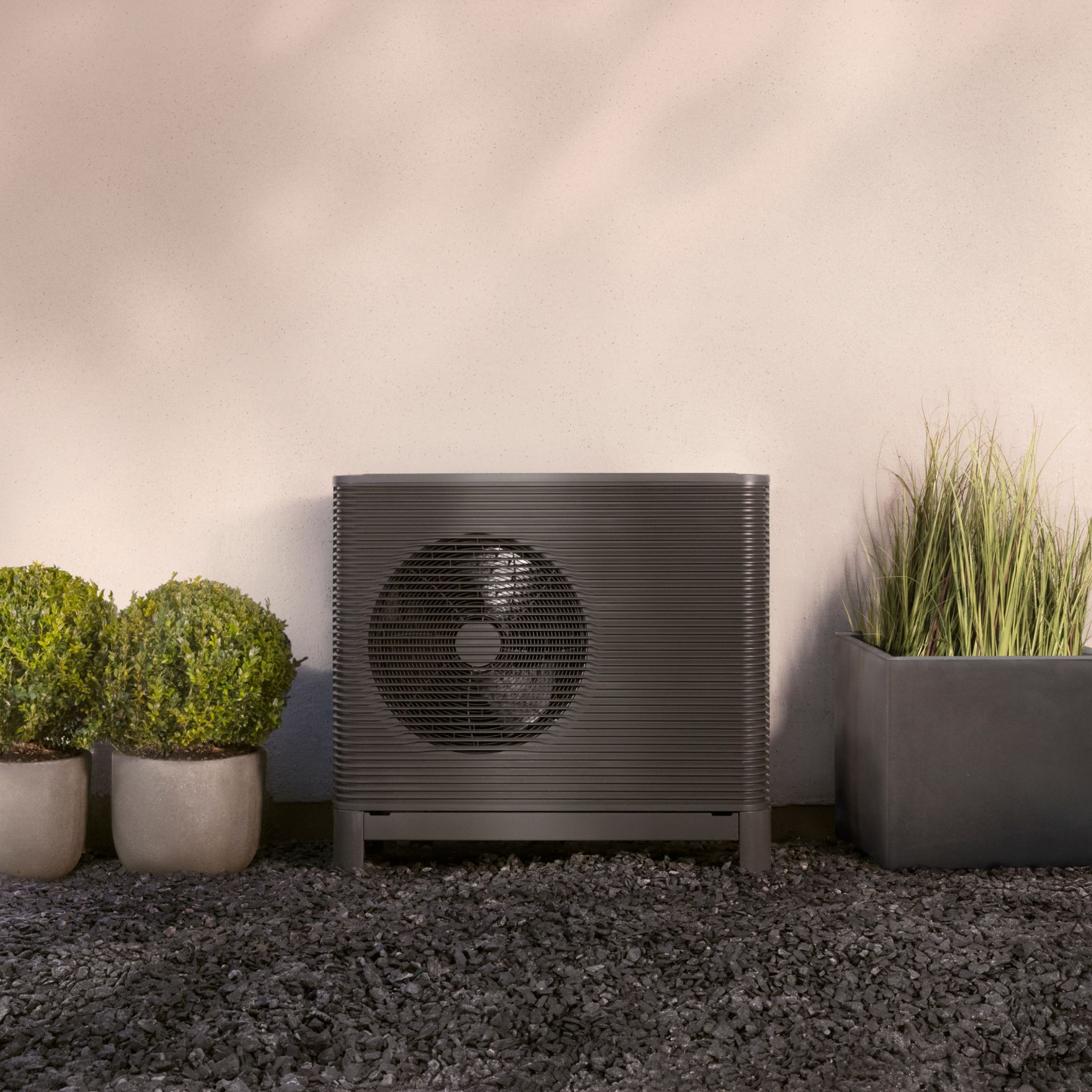 Aira heat pump installed on exterior of house