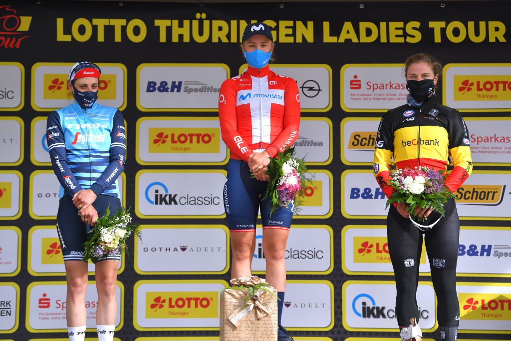 SCHMOLLN GERMANY MAY 25 Lucinda Brand of Netherlands and Trek Segafredo Emma Norsgaard Jorgensen of Denmark and Movistar Team Lotte Kopecky of Belgium and Team Belgium celebrate at podium during the 34th Internationale LOTTO Thringen Ladies Tour 2021 Stage 1 a 899km stage from Schmolln to Schmolln ltlt2021 lottothueringenladiestour womencycling on May 25 2021 in Schmolln Germany Photo by Luc ClaessenGetty Images