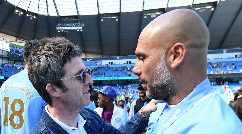 Noel Gallagher chats to Pep Guardiola after Manchester City&#039;s game against Huddersfield Town in May 2018.