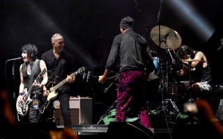 Joan Jett performs with Pat Smear, Krist Novoselic, Dave Grohl of the Foo Fighters during Cal Jam 18 at the San Manuel Amphitheater on October 6,2018 in San Bernardino, CA