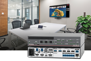 The new Extron 4K Collaboration and Presentation Switcher in front of an empty conference room.