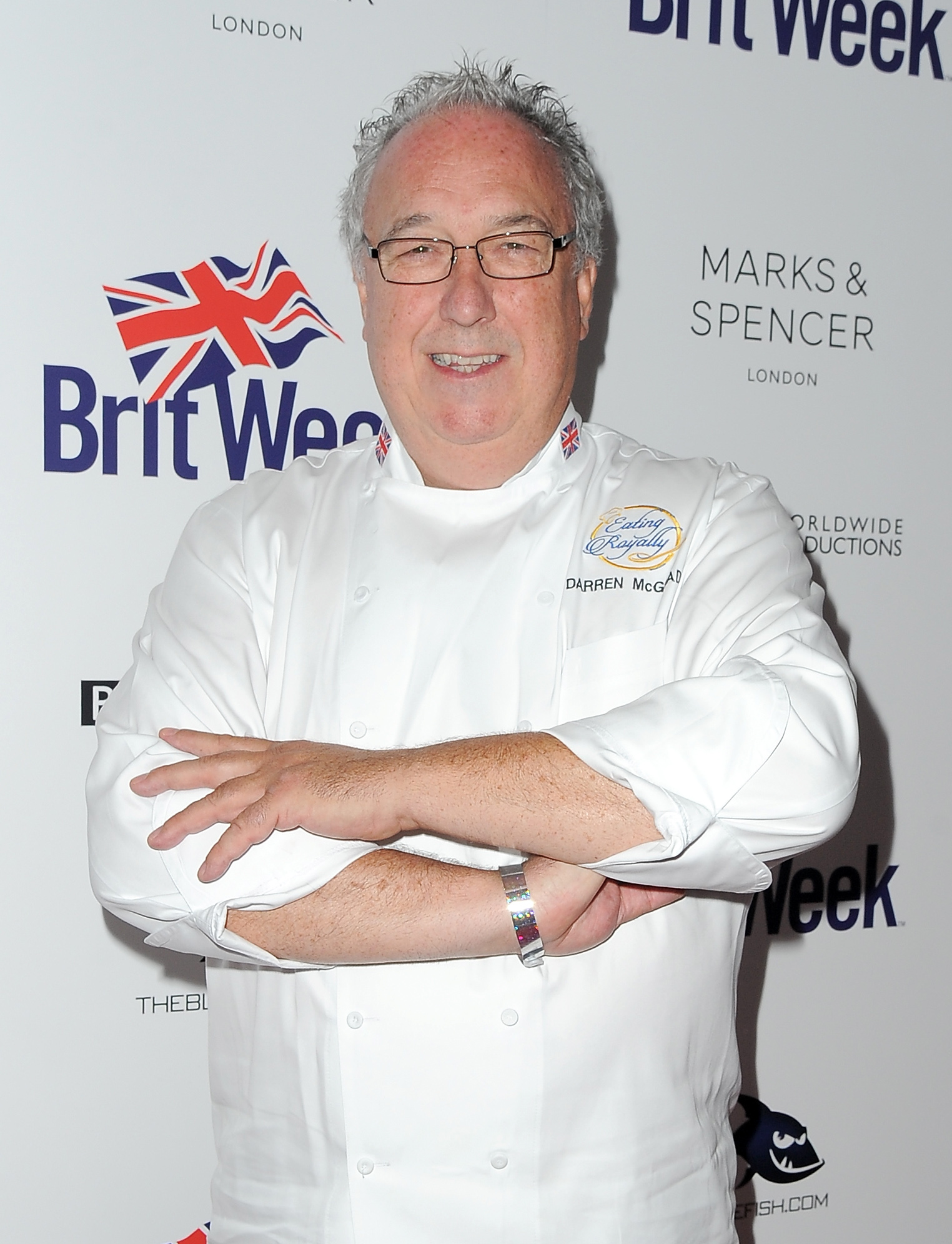 Darren McGrady posing in a chef coat