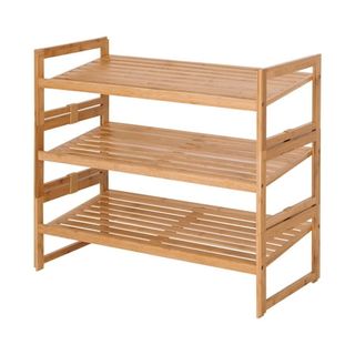 A bamboo three-tier shoe storage rack