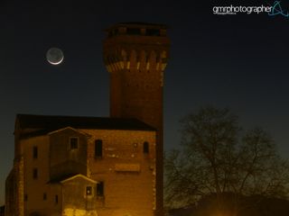 Moon Aglow with Earthshine Over Citadel by Giuseppe Petricca