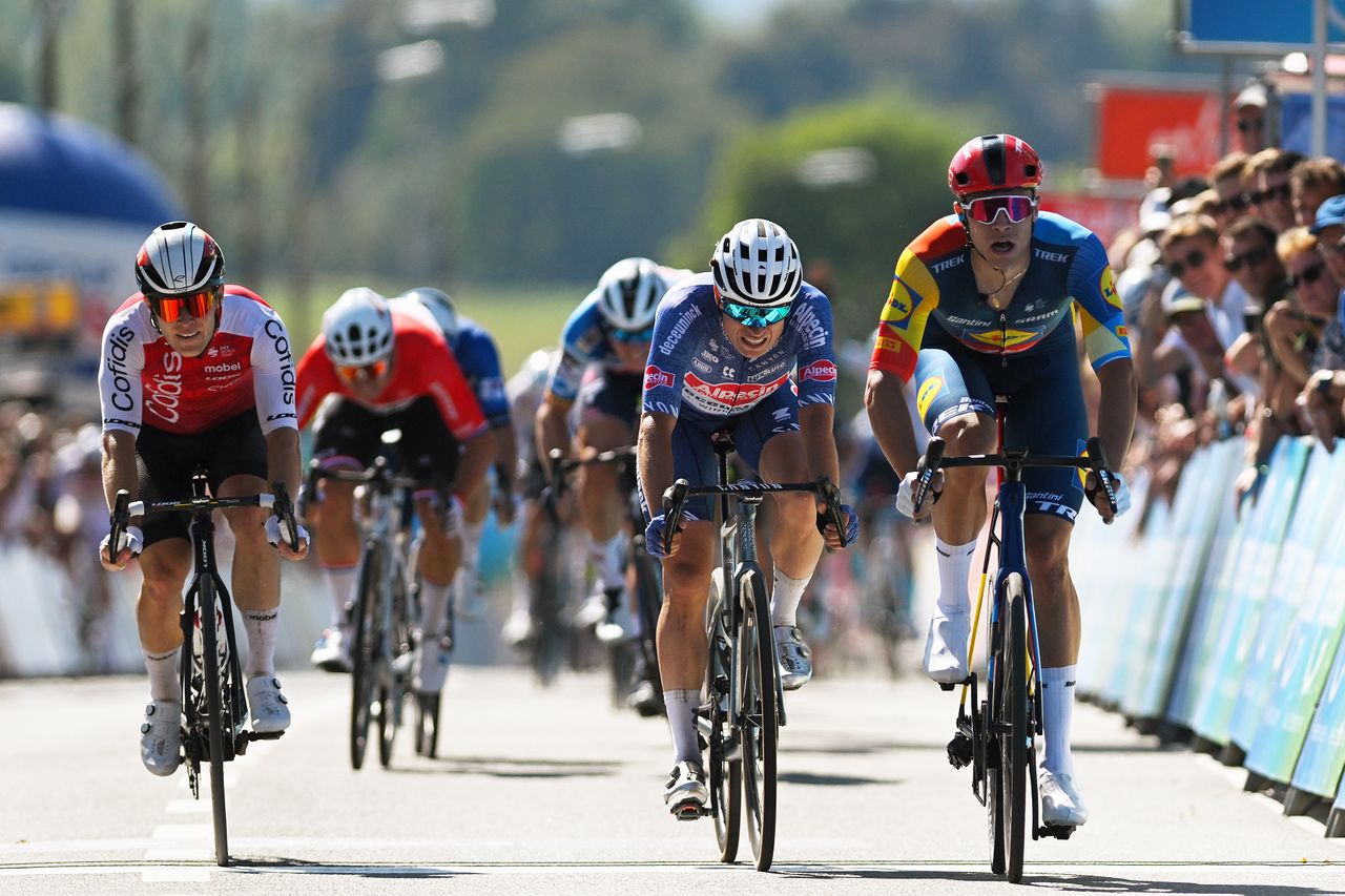BILZEN, BELGIUM - AUGUST 28: (L-R) Axel Zingle of France and Team Cofidis, Jasper Philipsen of Belgium and Team Alpecin - Deceuninck and Jonathan Milan of Italy and Team Lidl - Trek sprint at finish line to win the stage during the 20th Renewi Tour 2024, Stage 1 a 163.6km stage from Riemst to Bilzen / #UCIWT / on August 28, 2024 in Bilzen, Belgium. (Photo by Luc Claessen/Getty Images)