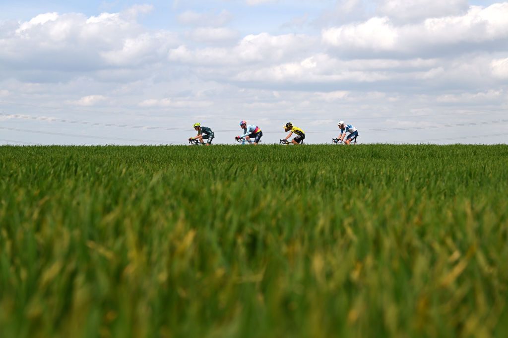 Alexander Hajek (Bora hansgrohe), Zeb Kyffin (TDT Unibet), Tosh Van Der Sande (Visma-Lease a Bike) and Enzo Leijnse (dsmfirmenich PostNL) in a breakaway