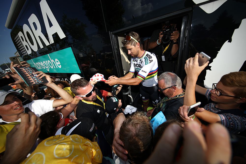 Peter Sagan with fans and the press after winning stage 2 at the Tour de France