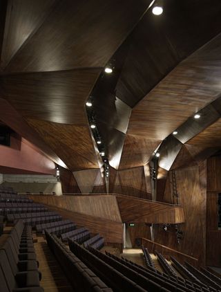 Geometric wooden panelling in the Lyric Theatre. 