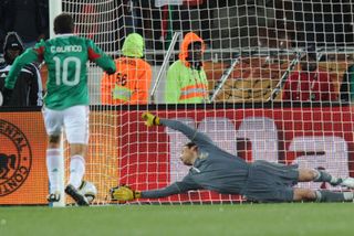 Mexico's Cuauhtemoc Blanco scores a penalty against France at the 2010 World Cup.