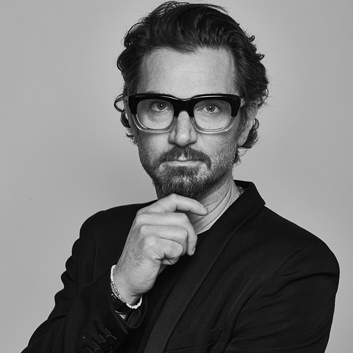 Adam Federico poses for a headshot.