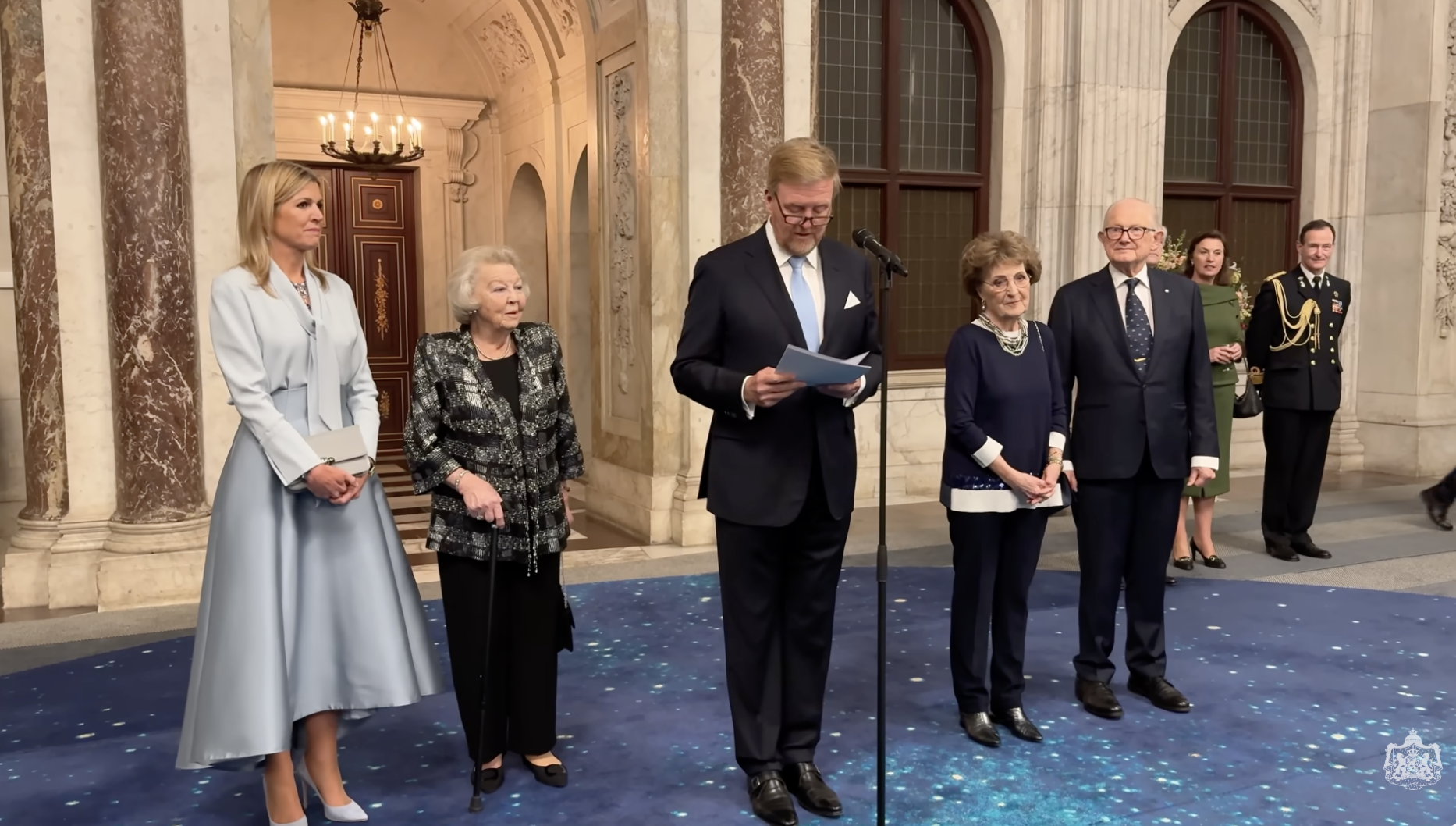Queen Maxima standing with Queen Beatrix and King Willem-Alexander for a New year speech 2026