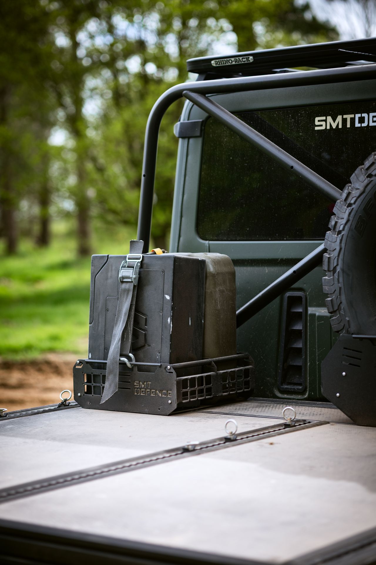 Image of the Ineos Grenadier looking exceptionally muddy. It's a flat-bed style pickup