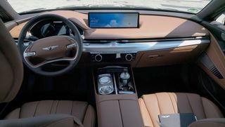 Full width view of the Genesis Electrified G80 from rear seats