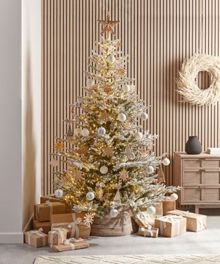 Japandi inspired Chrismas tree decorated in warm neutrals and rustic textures