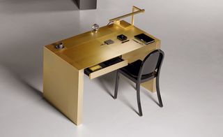 ’Adelchi’ desk in gold-plated brushed steel