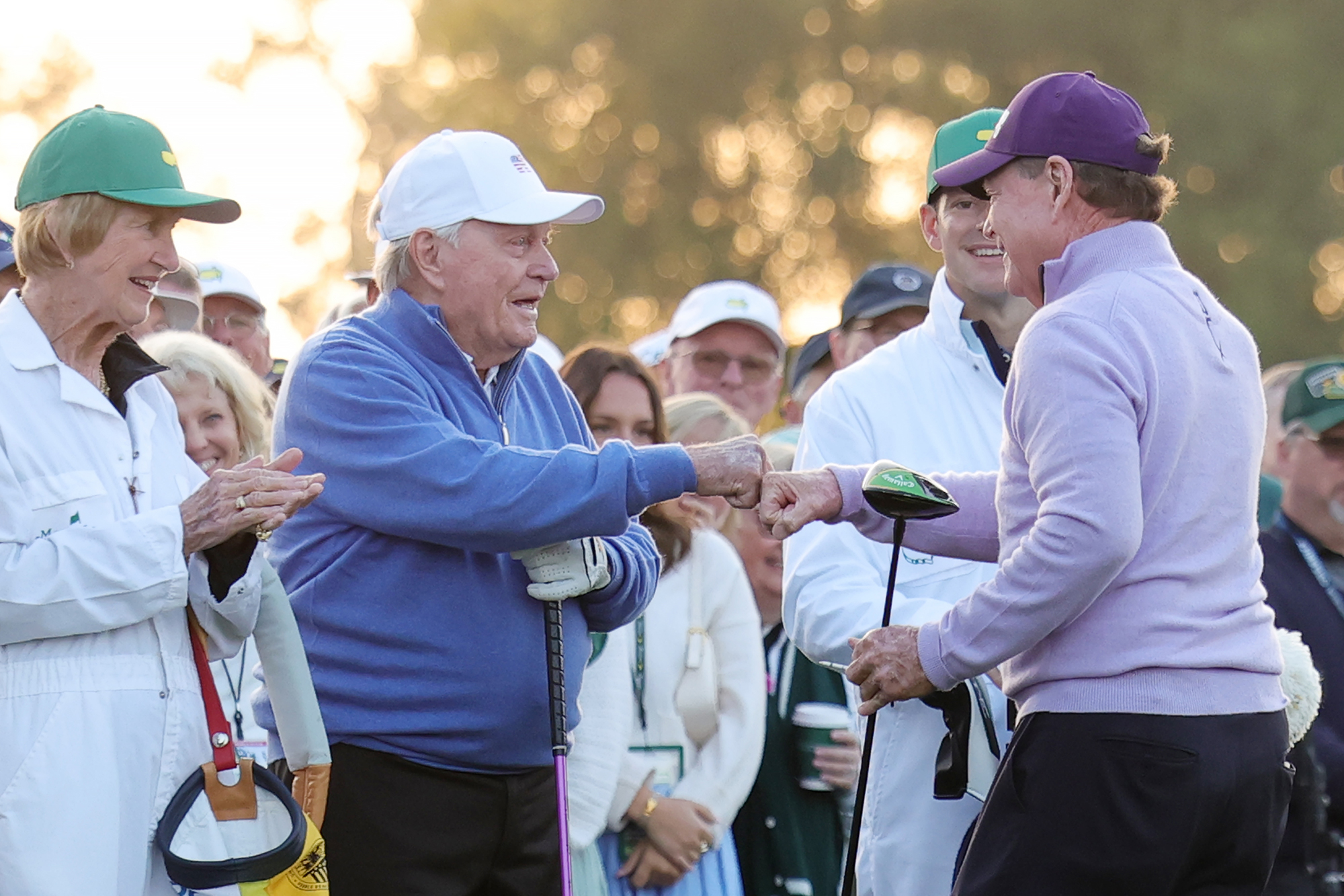 Jack Nicklaus fist bumping Tom Watson at The Masters, where both were honorary starters in 2025