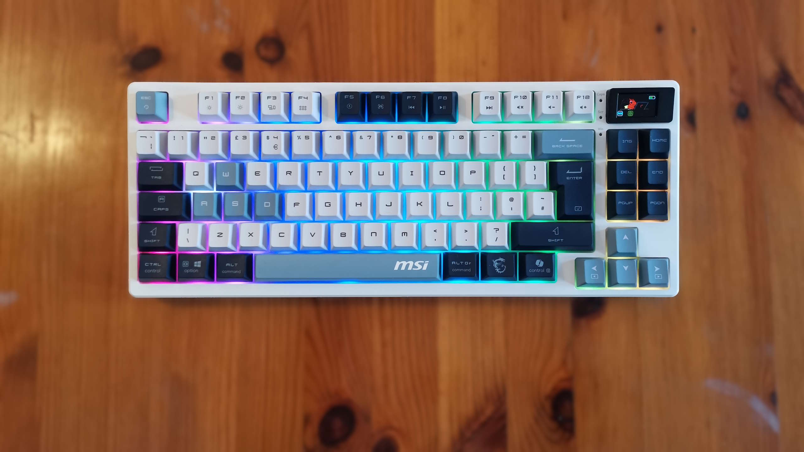 MSI Forge GK600 TKL gaming keyboard on a desk.