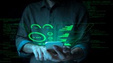 Businessman with a tablet projecting charts and figures to show sales growth