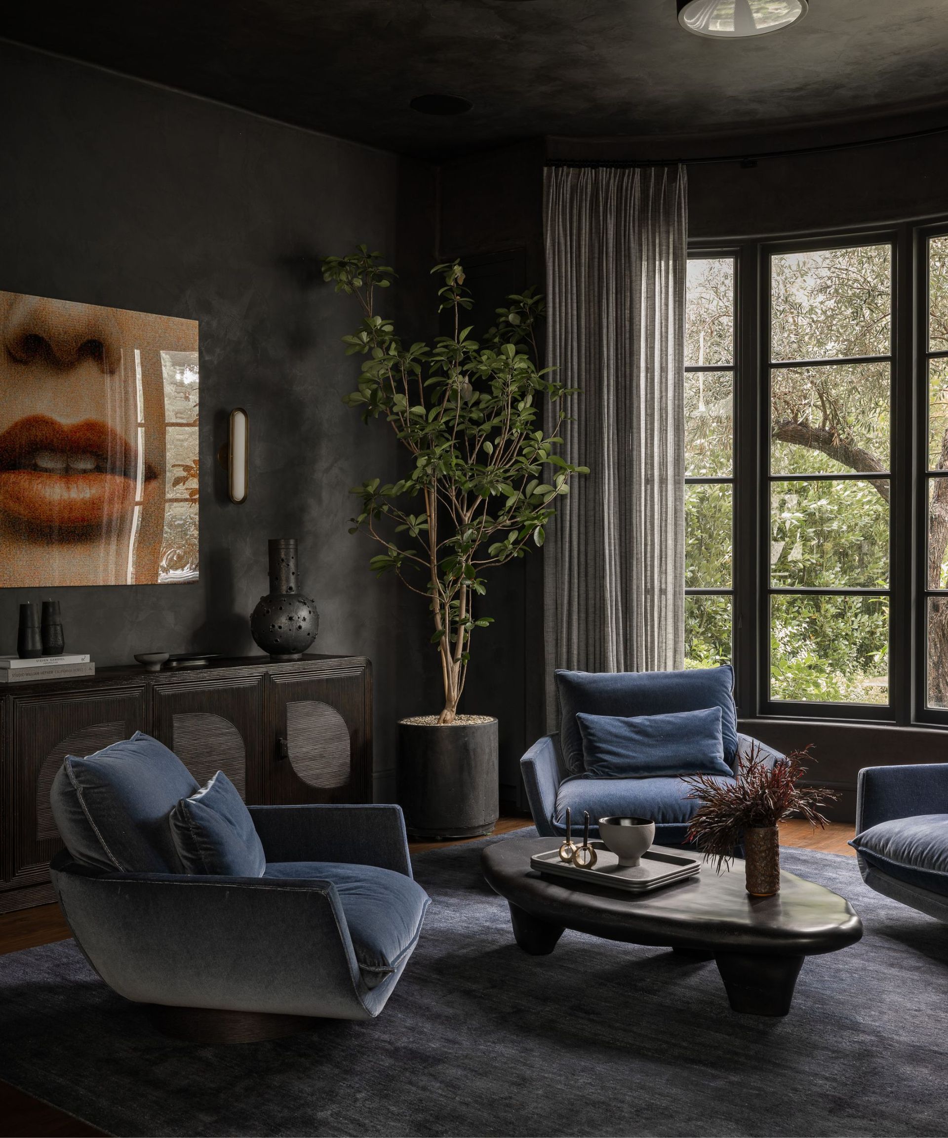 Living room furniture laid out in an informal layout for socialising