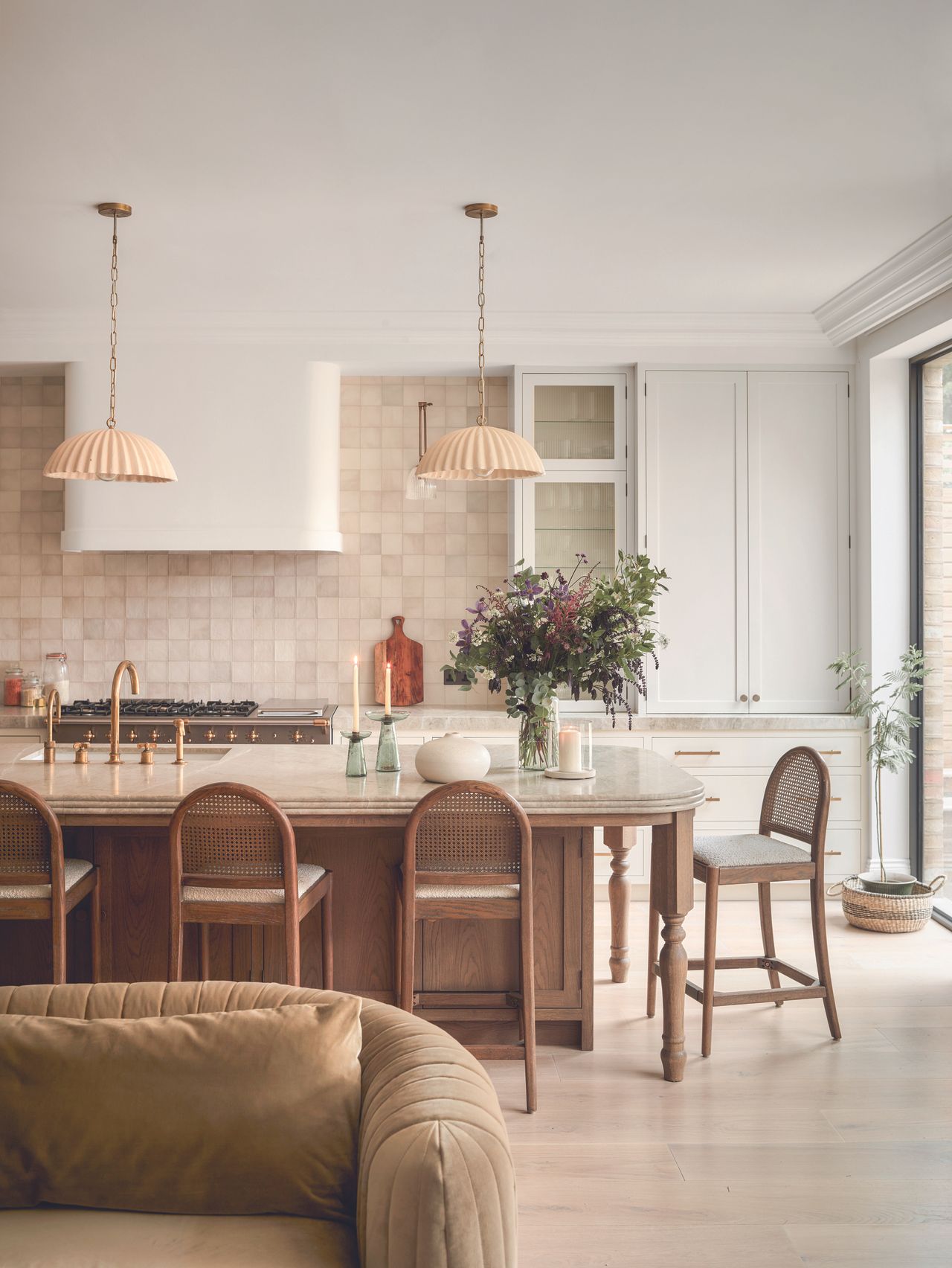 The neutral kitchen with a stand alone island